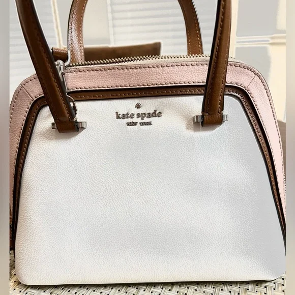 Small Kate Spade White and Pink Satchel with Brown Accents. - Picture 1 of 15